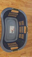 Top view of blue-gray Rubbermaid Hip Hugger laundry basket