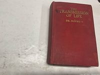 Front cover of red cloth hardcover book