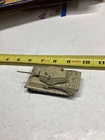 Overhead view of assembled King Tiger tank model beside tape measure