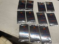 Front view showing 11 sealed McDonald’s Blue Jays Great Moments card packs