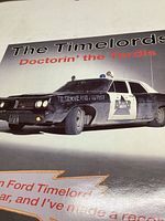 Front sleeve featuring car image and title text