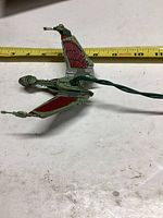 Full view of Klingon Bird-of-Prey ornament with measurement tape