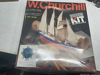 Front of sealed W. Churchill model boat kit box showing artwork and scale information