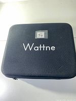 Closed Wattne branded carry case