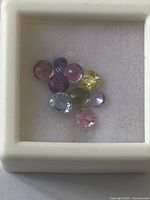 close-up of the multicolor sapphires in display box