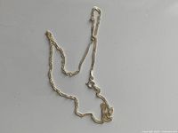 Full length view of the chain showing twisted links