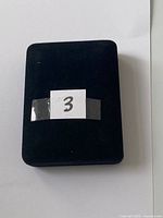 Closed dark velvet presentation box