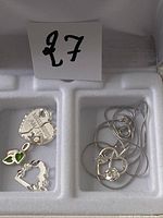 Necklace and three pendants in box