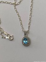 Close view of pendant, chain and clasp showing 925 stamp