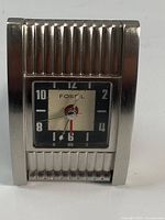 Front view showing dial and ribbed case