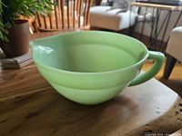 Side view of jadeite batter bowl showing handle and color