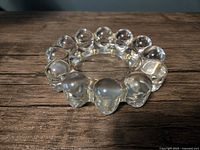 Top view showing round ashtray with twelve bubble nodes