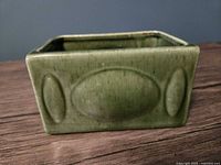 Front view of green Haeger rectangular planter showing bubble pattern