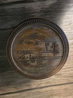 Close-up of single carved wooden coaster