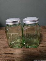 Front view of both shakers showing embossed SALT and PEPPER panels