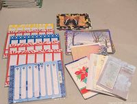 Weekly planner pads and greeting cards laid out