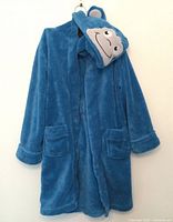 Front view of blue fleece housecoat with belt and monkey hood