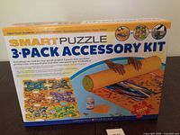 Front of sealed Smart Puzzle 3-Pack Accessory Kit box