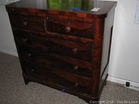 Front view of vintage cherry 5-drawer chest showing color, wood grain, and drawer layout.