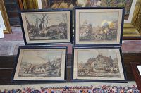 Four framed colored lithographs by Carle Vernet depicting hunting scenes, showing the overall set laid out on the floor.