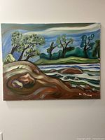 Full view of painting showing landscape scene on canvas