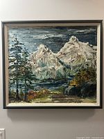 Full view of framed mountain scene painting