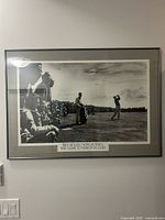 Full view of framed Ben Hogan poster on wall