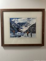 Front view of framed photograph on wall