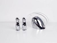 Overall view of napkin holder and both penguin shakers