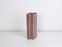 Front view of pink geometric ceramic vase