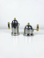 front view of sugar bowl and creamer showcasing design and materials