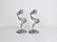 Front view of both spiral metal bud vases