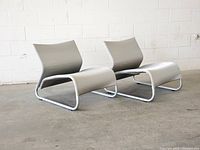 Front three-quarter view of both Oppala chairs