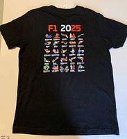 Back of t-shirt showing F1 2025 race schedule graphic