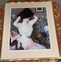 Front view showing print, matting and gold tone frame