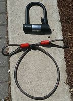 U-lock and loop cable laid out side by side