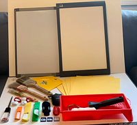 Overview of entire lot showing whiteboards, paint tools, folders, cable ties, mouse, SD cards