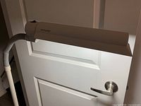 Lamp illuminated showing wing shade and OttLite logo