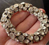 Full view of circular stretch bracelet showing crystal settings
