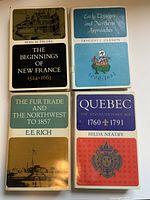 Front covers of all four Canadian Centenary Series volumes