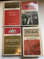 Front covers of all four volumes