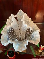 Top view showing three ruffled trumpet horns and hobnail pattern