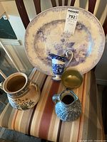 Group shot showing platter, three ceramic pieces and small bowl