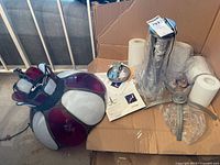 Boxed Hubbardton Forge parts, paperwork, vintage stained glass pendant