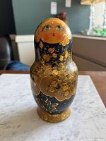 Front view of largest hand-painted doll