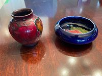 Vase and dish together on tabletop