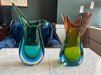 Front view of both multicoloured glass vases