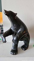 Front view of soapstone polar bear carving