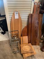 Group shot of all boards and metal fruit stand