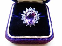 Ring in velvet box showing amethyst and tanzanite stones